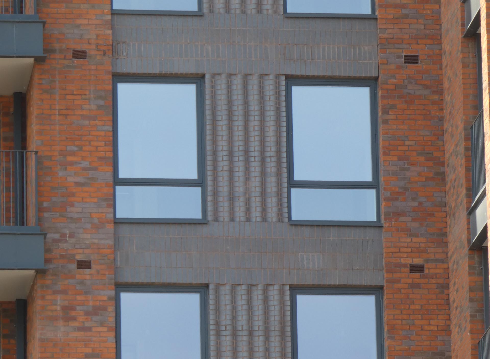 special Staffordshire blue wavy bricks add detail to this residential project in Glengall Road